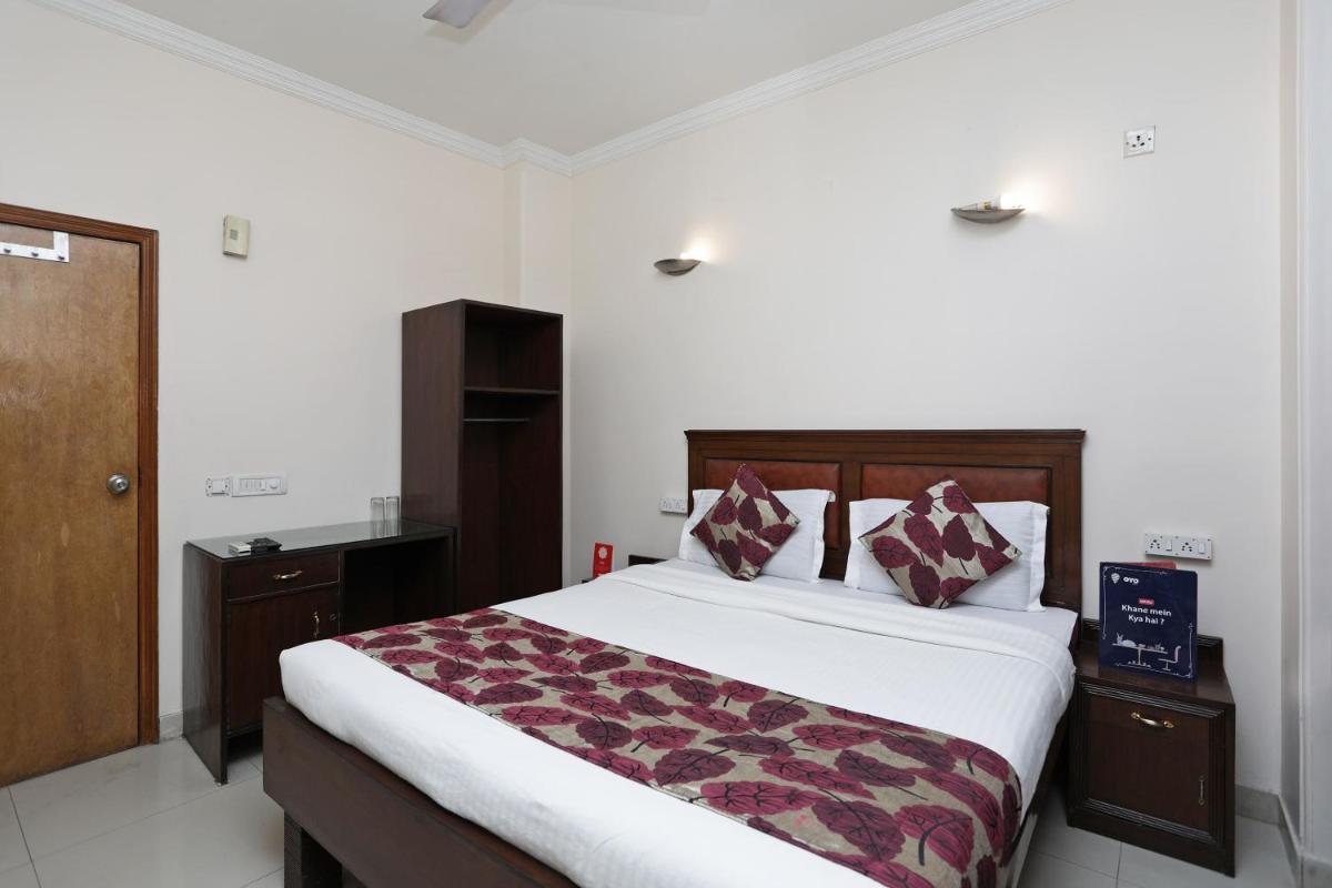 Capital O Hotel Grand Rooms
