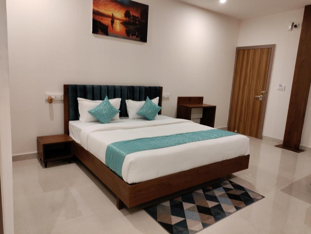 Zing Rooms by GuestHouse Suites